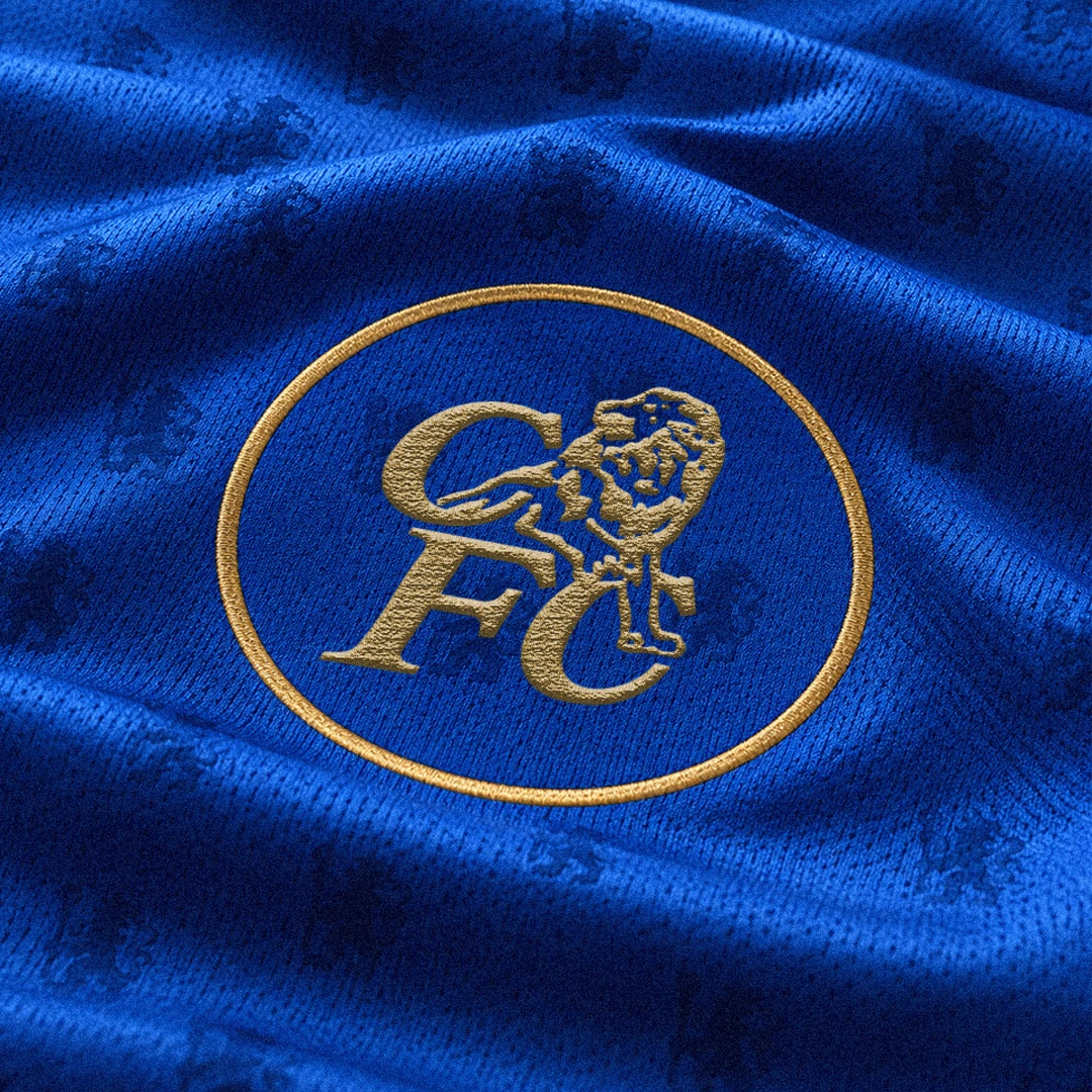 Gold Chelsea crest close-up on blue fabric